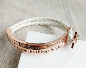Engraved Bangle with White Cord on Rose Gold: Sisters are like stars, they make
